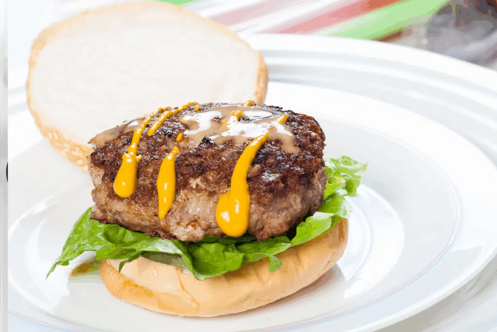 hamburger with mustard Photo Credit Canva pro Stock Image