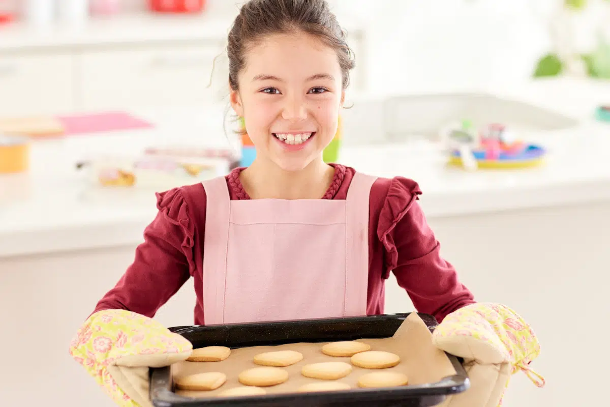 kid baking Photo Credit Canva Pro Stock Image