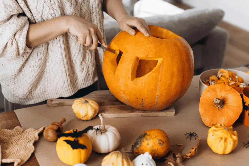 pumpkin carving Photo Credit Canva Pro Stock Image