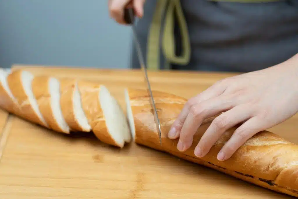 slicing bread Photo Credit Canva Pro Stock Image