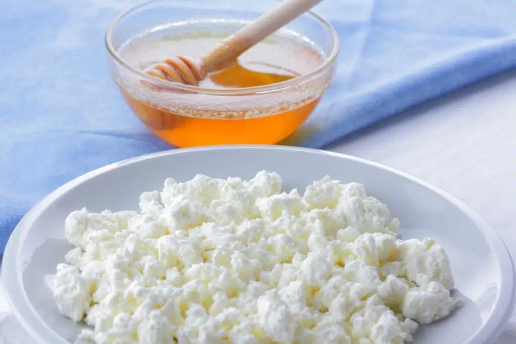 Cottage cheese and honey Photo Credit Canva Pro Stock Image