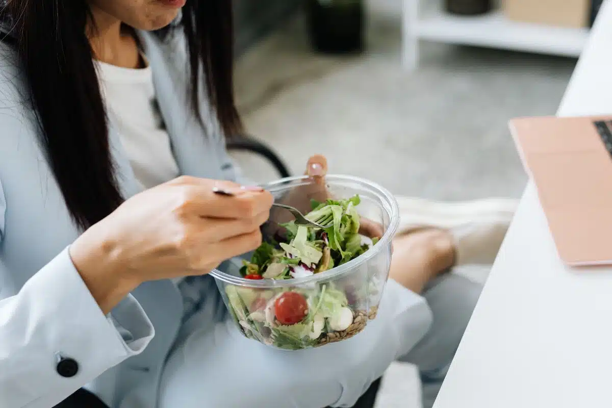Eating Salad Photo Credit Canva Pro Stock Image