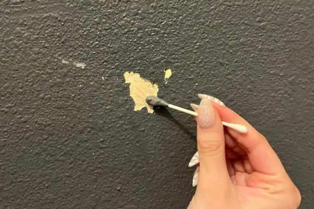 Touching up paint qtip Photo Credit House Digest