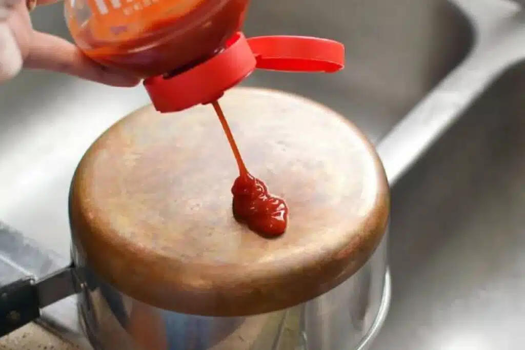 Ketchup cleaning pot Photo Credit Pro Housekeepers