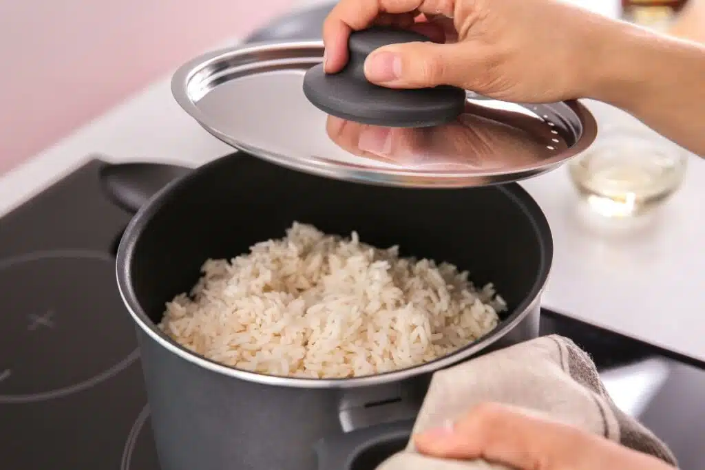 cooking rice photo Credit Canva Pro Stock Image