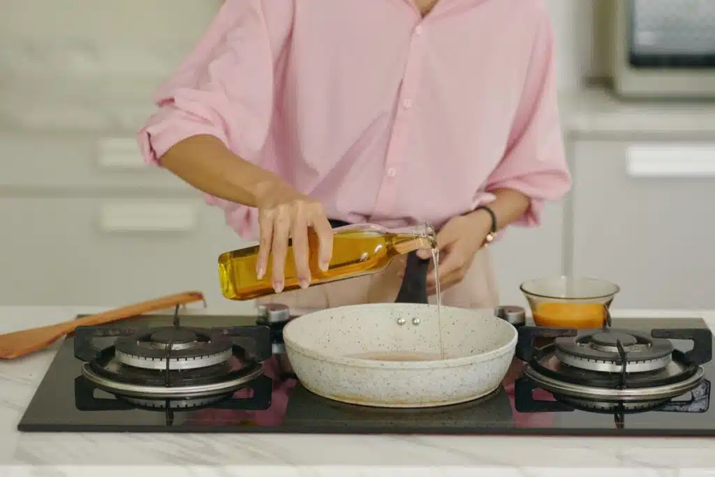 oil in pan Credit Canva Pro Stock Image