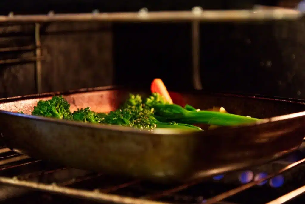 Vegetables in oven on middle rack Photo Credit Canva Pro Stock Image
