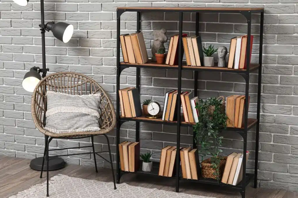 Bookcase books chair Photo Credit Canva Pro Stock Image