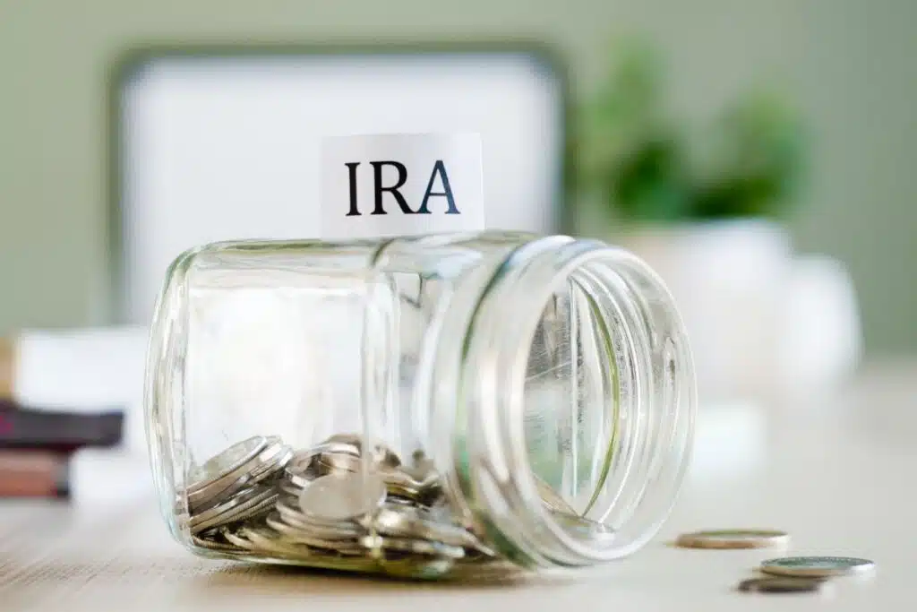 IRA Risk money in jar Photo Credit Retired In USA