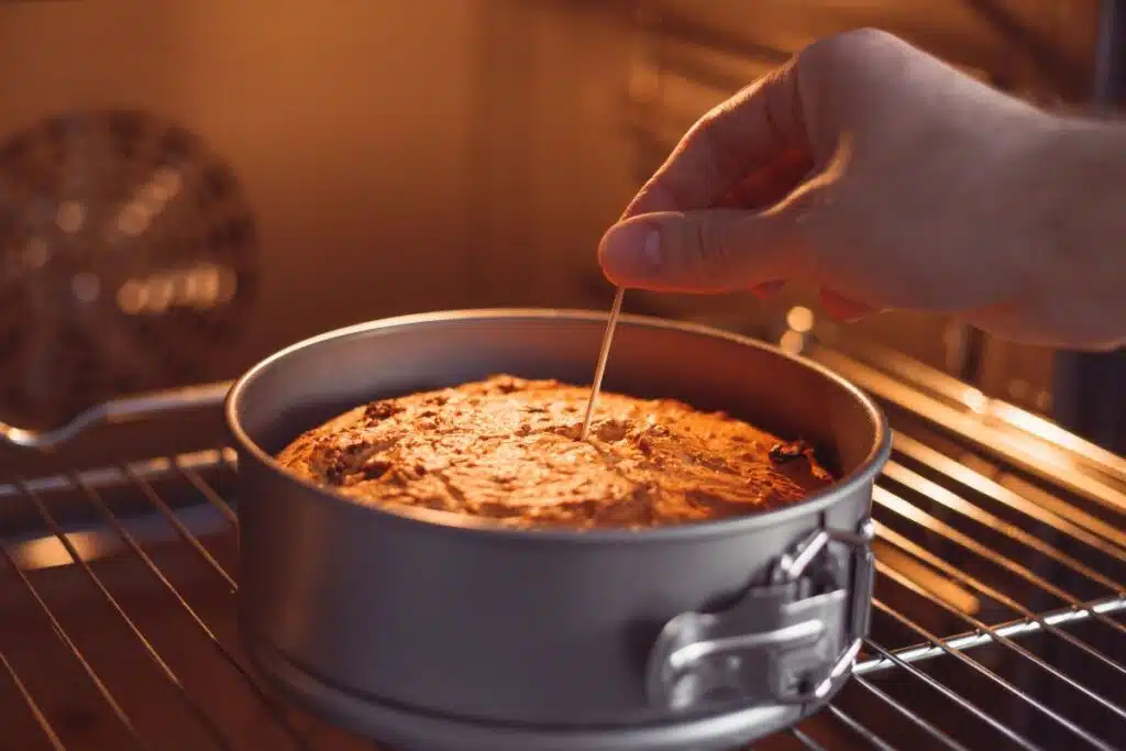 Toothpicks testing cake Photo Credit Canva Pro Stock Image