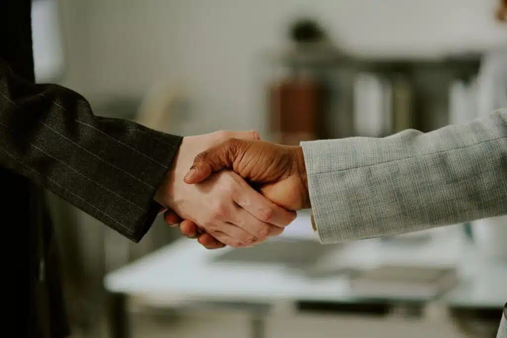 shaking hands Photo Credit Canva Pro Stock Image