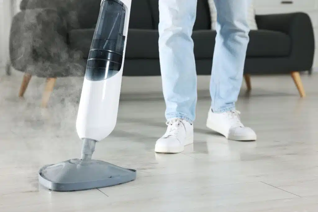 steam mop floor living room Photo Credit Canva Pro Stock Image