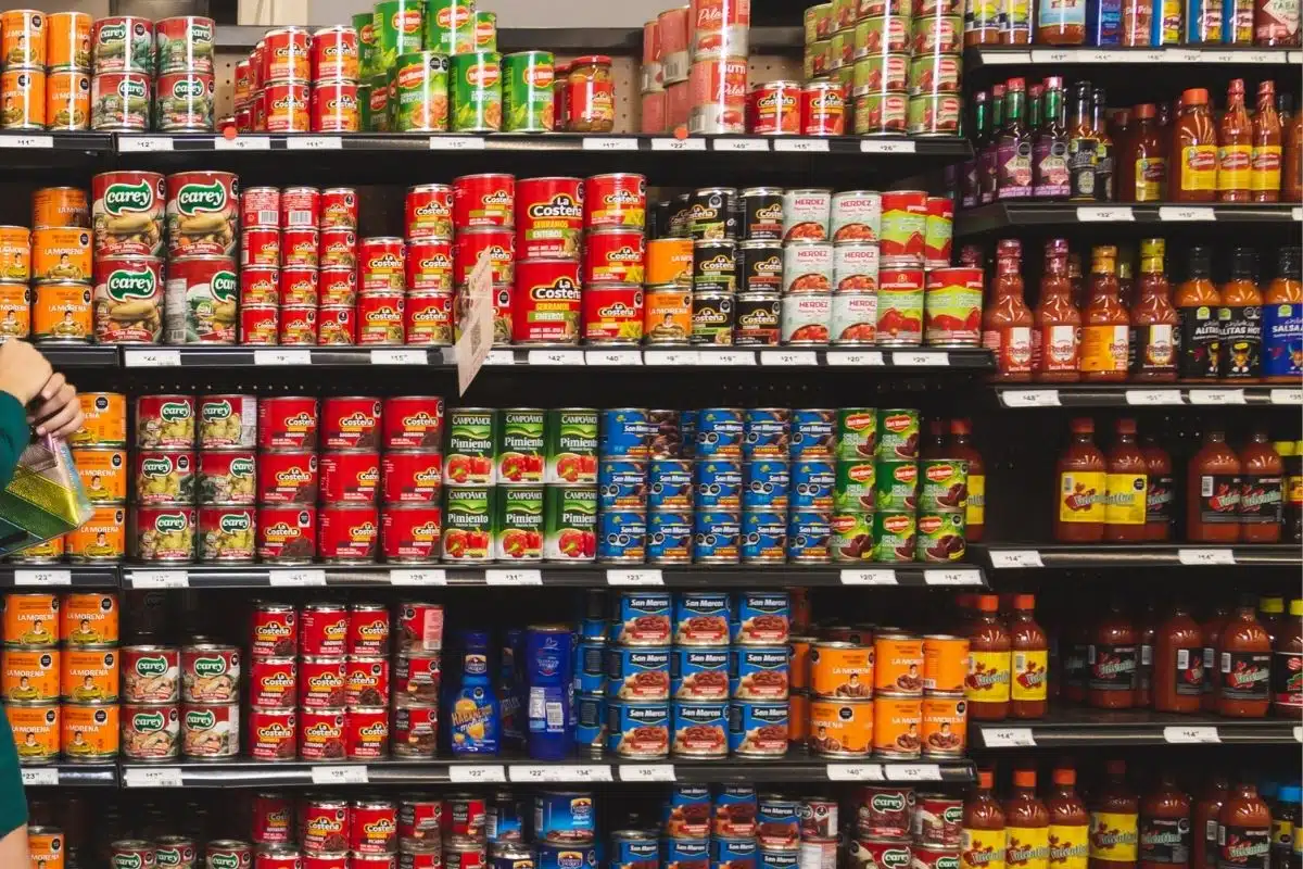 canned good section grocery store Photo Credit Canva Pro Stock Image