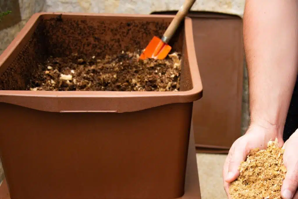 Compost turning Photo Credit Canva Pro Stock Image