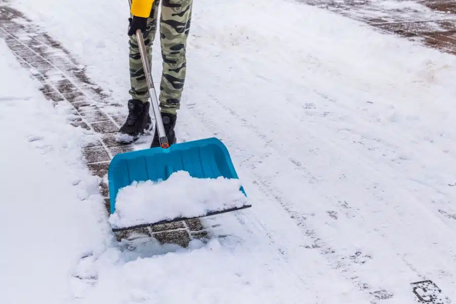 Shovel with snow Photo Credit Canva Pro Stock Image