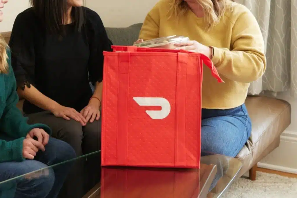 Customer with Doordash Delivery Photo Credit NBC