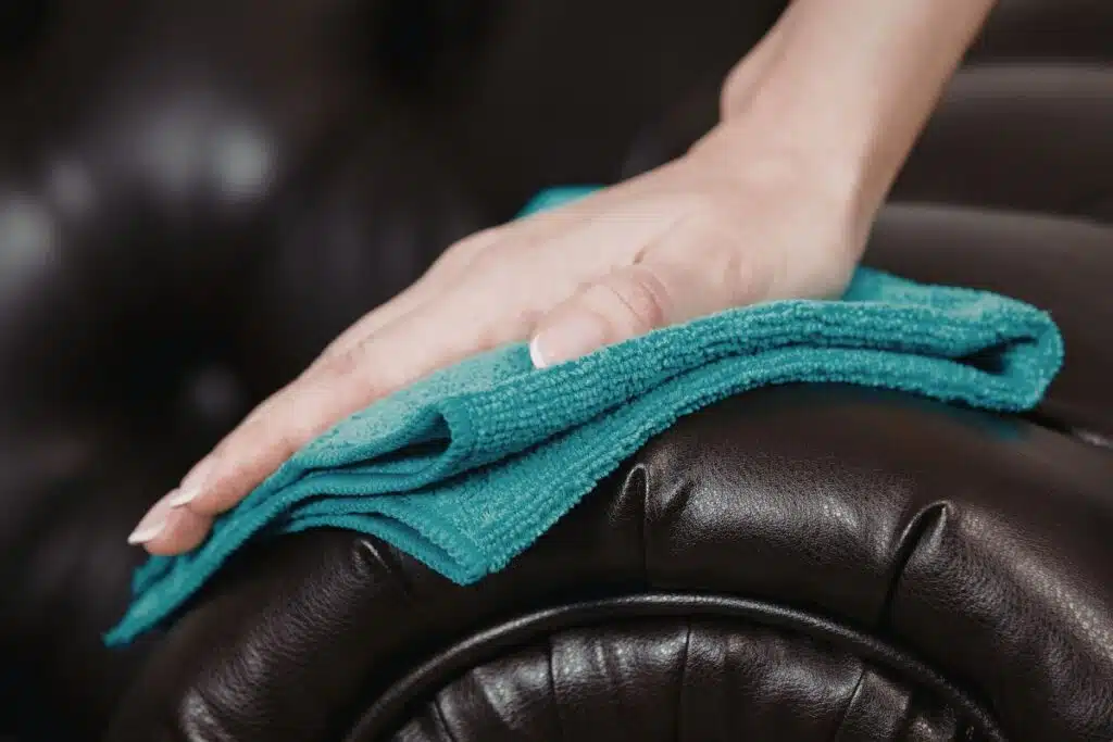 Microfiber cloth couch polishing leather Photo Credit Canva Pro Stock Image
