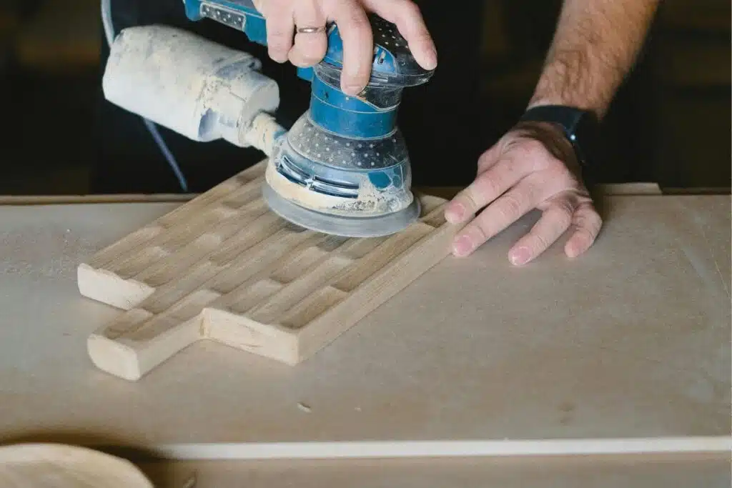 Sanding Cutting board Image Credit Canva Pro Stock Image