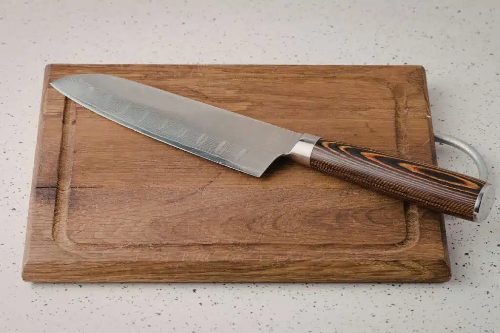 knife on cutting board Photo Credit Canva Pro Stock Image
