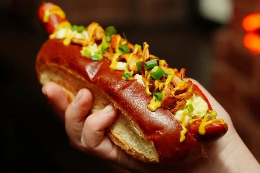 Hot Dog on pretzel bun Photo Credit Canva Pro Stock Image