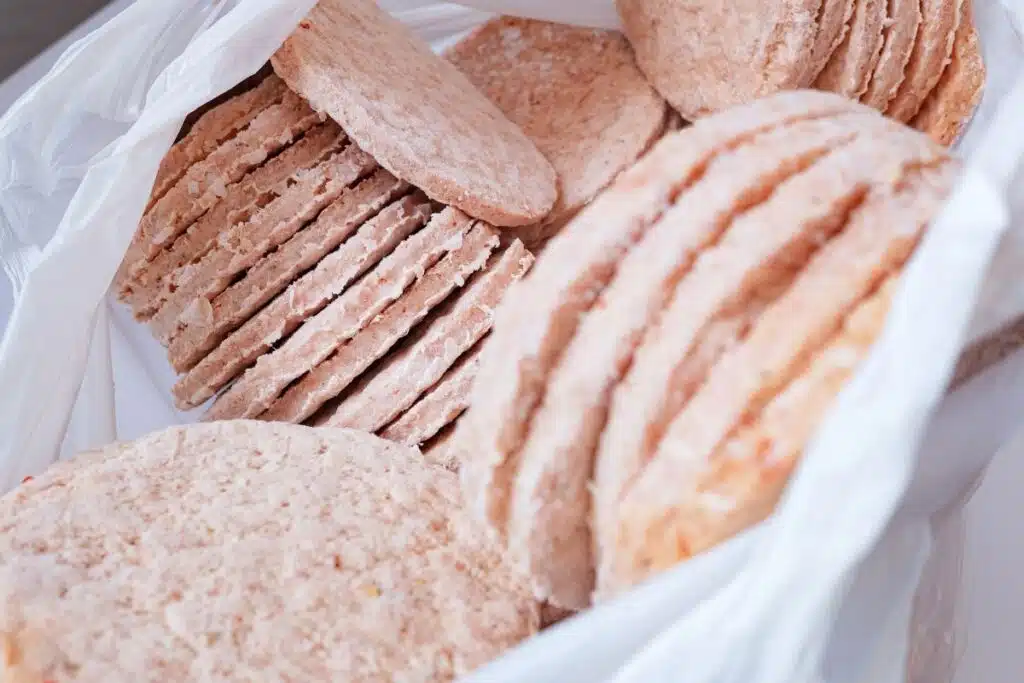 Frozen Hamburger Patties in bag Photo Credit Canva Pro Stock Image