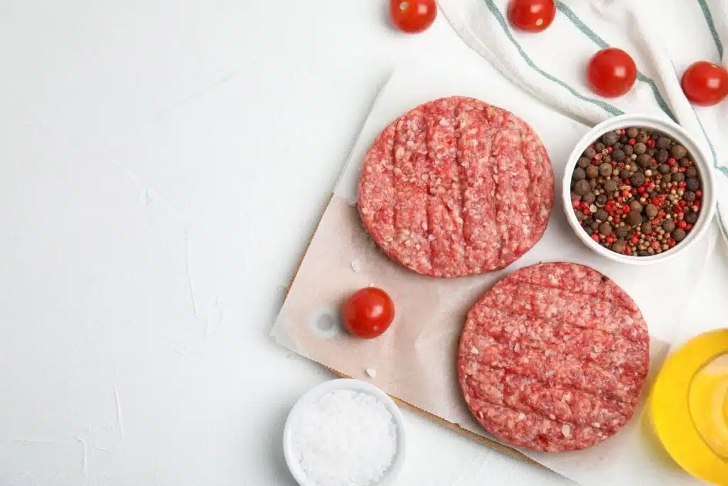 Hamburger Patties and ingredients Photo Credit Canva Pro Stock Image