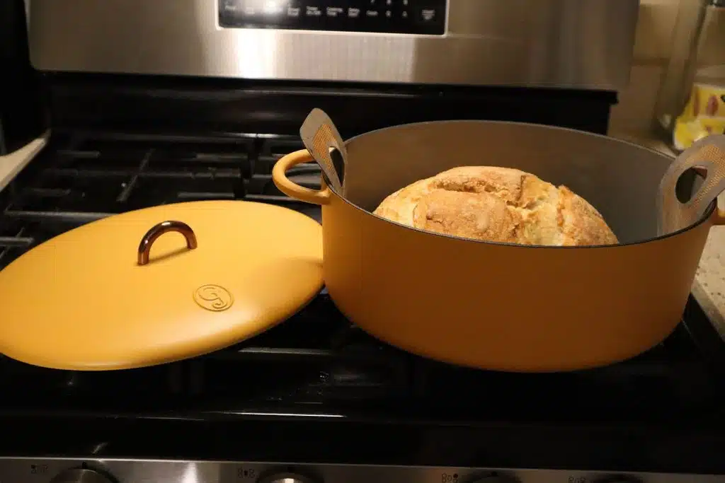 Great Jones Dutch Oven with bread on stove Photo Credit Inspiring Savings